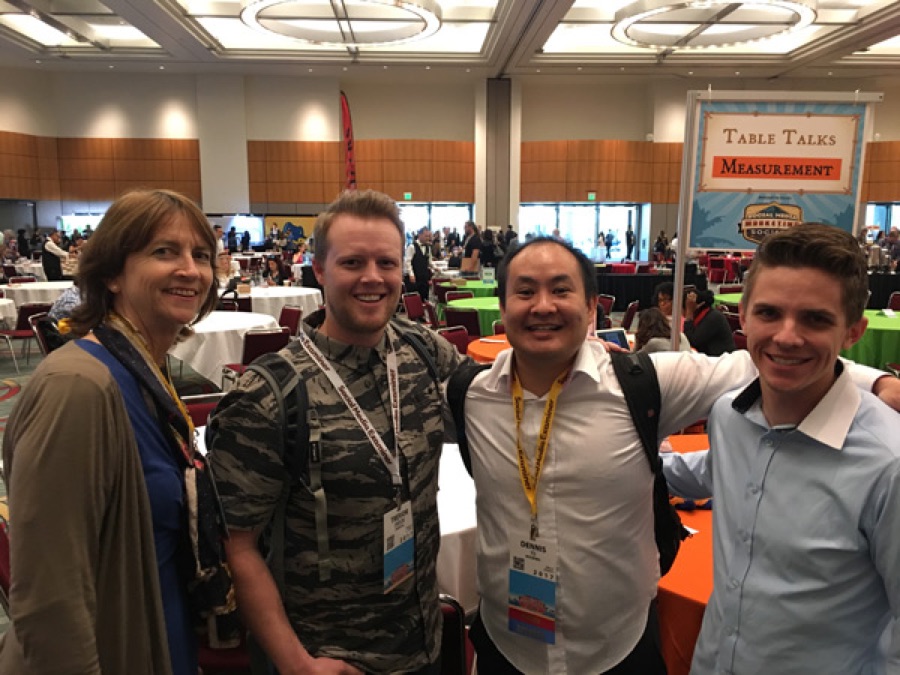 Dennis Yu with young marketers at a conference